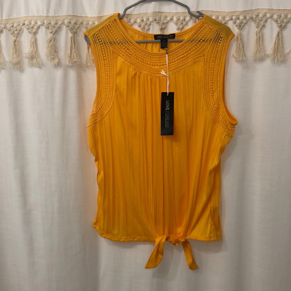 Mustard sleeveless women’s shirt